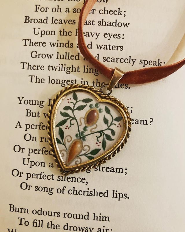 Art Nouveau heart. A painted heart-shaped locket