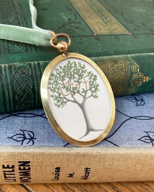 Leof. Old English for “beloved”, in an oval locket