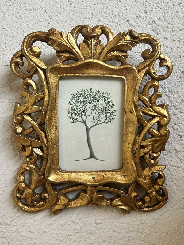 May it be. A tree in an ornate gilt frame