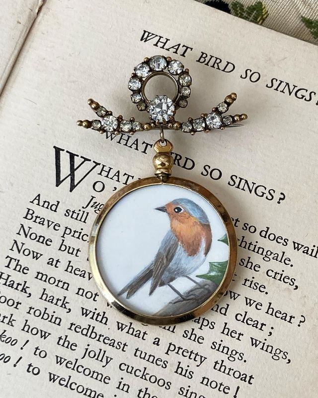 Robin dangle brooch. Hung from an antique paste brooch