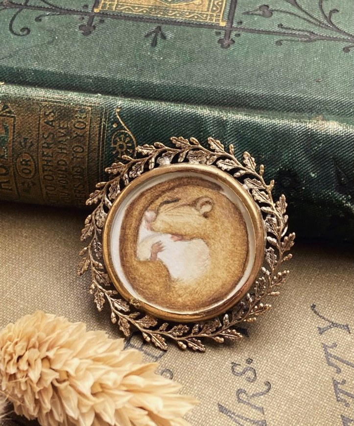 Sleepyhead. A hazel dormouse in a vintage Edwardian locket brooch