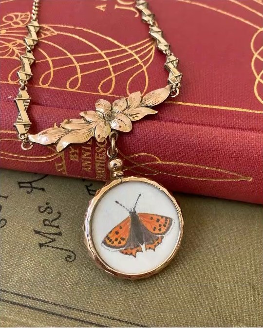 Small copper. In an Edwardian vintage locket