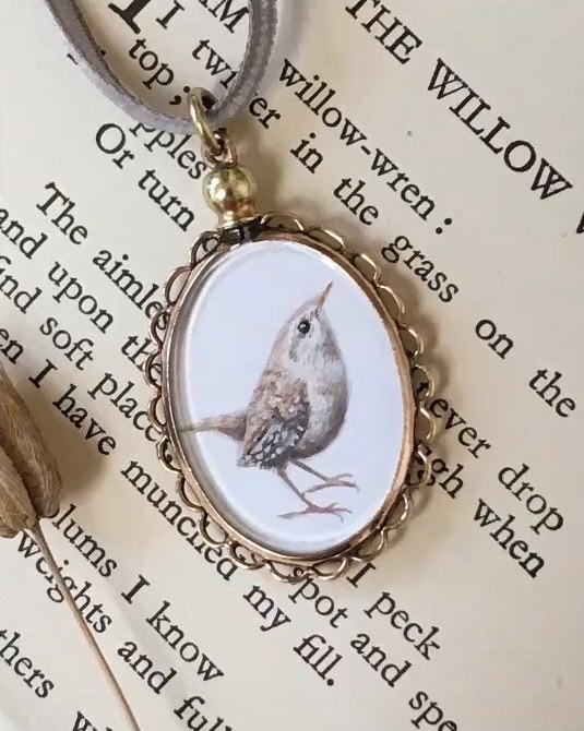 Wren. In an antique Edwardian locket