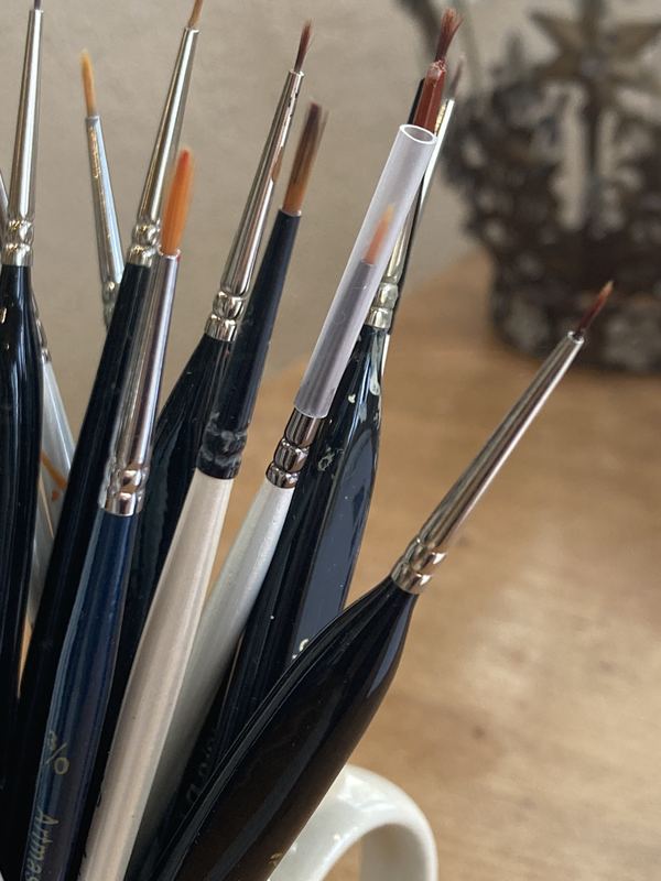 Brushes for coin-sized paintings